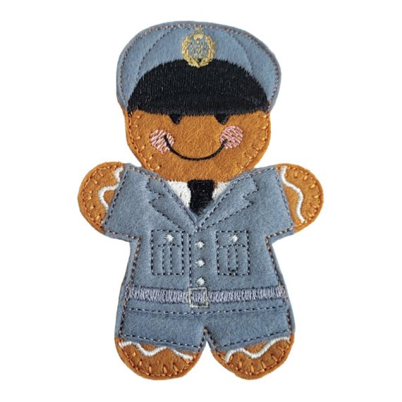RAF Dress Uniform Gingerbread Character handmade from soft felt, wearing full RAF dress uniform with tailored jacket, trousers, tie, and peaked cap featuring embroidered gold emblem.
