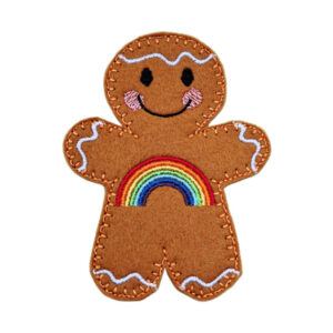 Rainbow Smiles Gingerbread Character — a cheerful felt gingerbread figure with a vibrant embroidered rainbow across its front and a happy smile, symbolising hope, joy, and new beginnings. Crafted from soft felt with premium stitching, this whimsical decoration makes a thoughtful gift or uplifting keepsake for any occasion.
