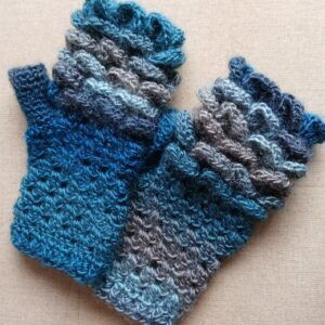 Pair of crocheted fingerless gloves in a dragon scales design.. All proceeds to The Stroke Association