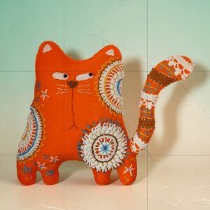 Made to order.Ginger cat decoration. Hand embroidered with vintage, crocheted lace fabric.Filled with lavender. All proceeds to The Stroke Association .