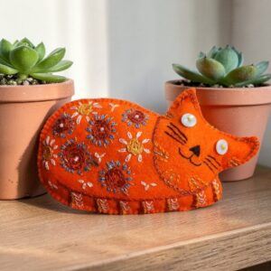 Made to order.Ginger cat decoration. Hand embroidered.Filled with lavender. All proceeds to The Stroke Association .