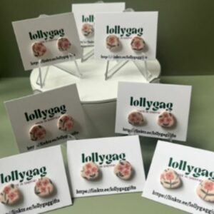 Collection of handmade polymer clay flower stud earrings displayed on Lollygag cards, colourful quirky earrings handmade in Sheffield UK