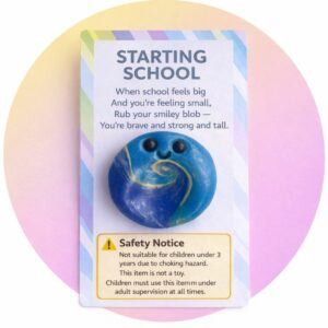 Handmade polymer clay Starting School Smiley Blob worry stone on affirmation card reading “Starting School” with visible safety warning stating not suitable for children under 3 years due to choking hazard and not a toy