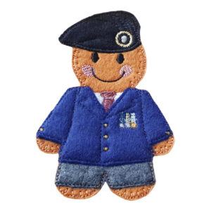 Handmade felt Veteran Gingerbread Character wearing a blazer, trousers, tie, and signature beret, with embroidered medal details. A 4-inch keepsake honouring veterans and military service.