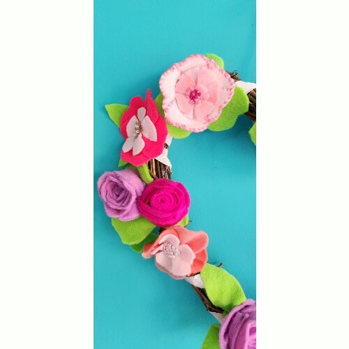 Hanging Wicker Heart Wreath with handmade, embroidered and embellished felt flowers, 28 cm - Image 3