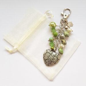 Handmade Green Beaded Bag Charm with Puzzle Heart - Unique Keyring or Bag Clip Gift