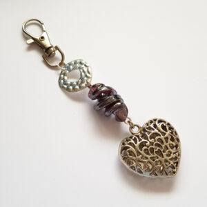 Handmade Ornate Heart Bag Charm - Clip-On Keychain Accessory with Glass Beads and Textured Ring