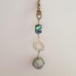 Handmade Paua Shell Bag Charm - Clip-On Keychain with Textured Silver Ring and Floral Glow Bead