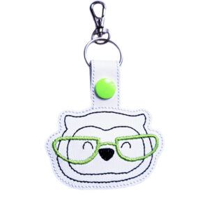 Owl face keyring with lime green glasses, made from white faux leather with a metal split ring and swivel clasp.