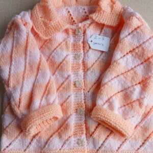 Hand knitted child’s cardigan. Approx 2 to 3 yrs. All proceeds to The Stroke Association