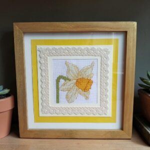 Hand embroidered daffodil in a frame. All proceeds to The Stroke Association