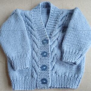 Hand knitted baby cardigan. Approx 0 to 3 mths. All proceeds to The Stroke Association