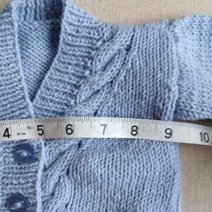 Hand knitted baby cardigan. Approx 0 to 3 mths. All proceeds to The Stroke Association
