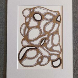 Abstract artwork inspired by zentangling, in black and gold