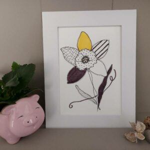 Framed mixed media floral illustration with patterned petals