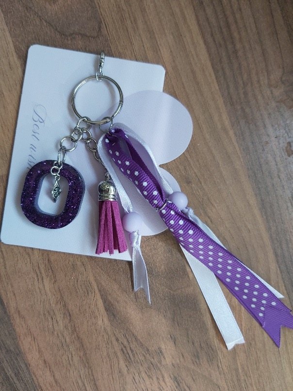 Handmade Purple Glitter Resin Oval Keychain with Tassel and Ribbon Charms