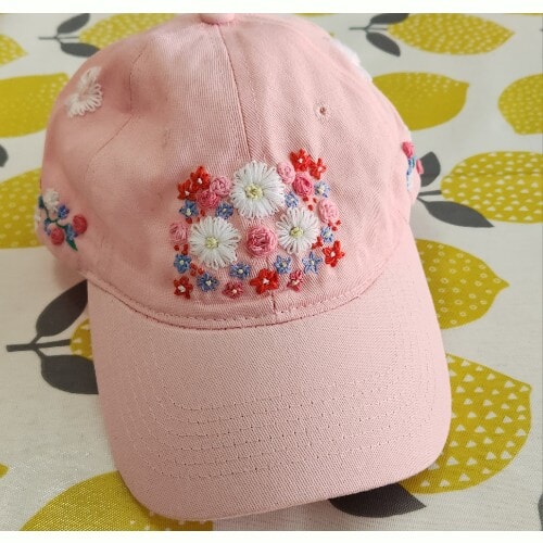 Ladies Pastel Pink Baseball Cap, with hand embroidered roses and daisies