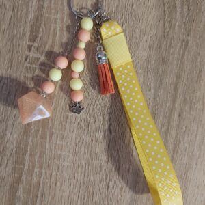 Pastel Peach & Yellow Beaded Wristlet Keychain with Crown & Tassel Charms