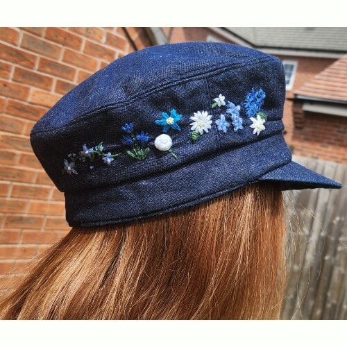 CUSTOM ORDER For Hayley, Denim Cap, hand embroidered with a variety of blue and white flowers, and leaves