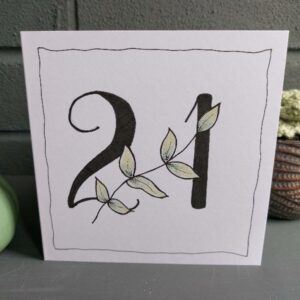 white 5" x 5" 21st birthday card. Black 121with botanical stem feature