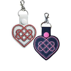 Black Celtic Heart keyring attached to a set of keys, showing its size and everyday use.