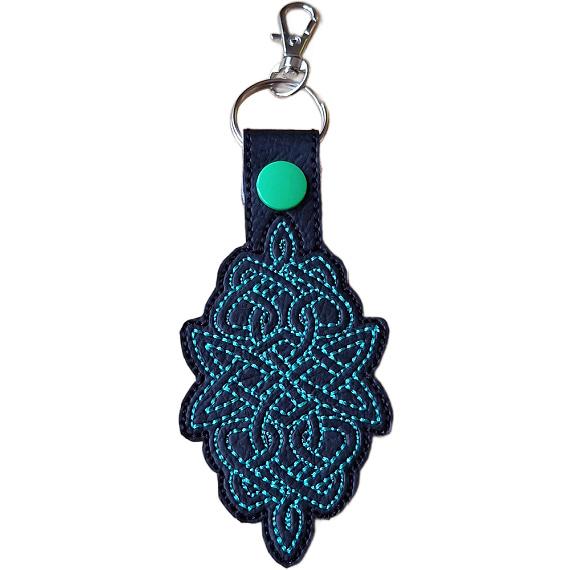 Black Celtic Knot keyring with jade embroidered knotwork design, jade snap and silver metal clasp.