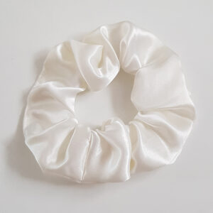 Cream coloured satin scrunchie on a white background, handmade hair accessory