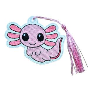 Pink embroidered axolotl bookmark with bright pink gills, pale blue edging and a lilac tassel, designed as a cute book buddy for readers.