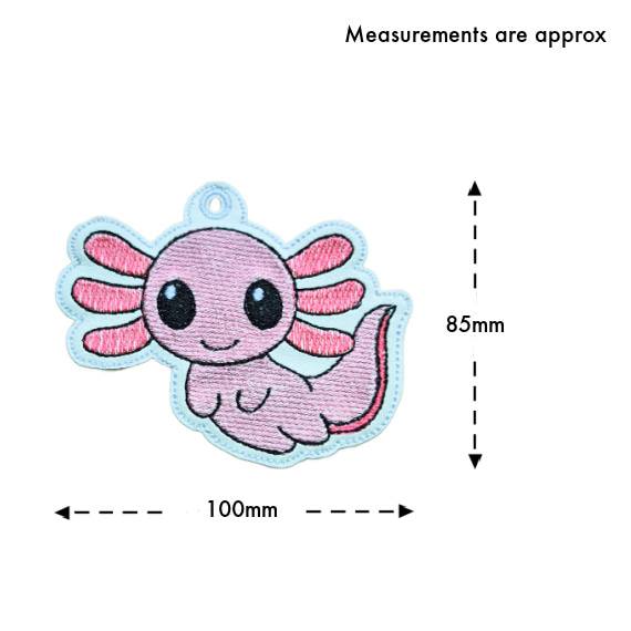 Pink embroidered axolotl bookmark size guide showing approximate measurements of 100mm wide by 85mm high.