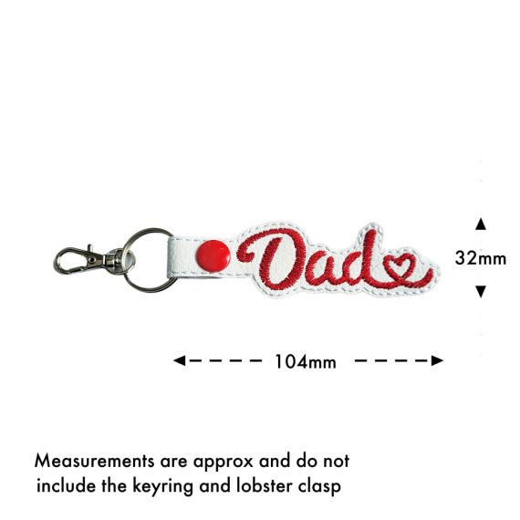 Size guide for white Dad Heart keyring showing approximate measurements of 32mm x 104mm, excluding the keyring and lobster clasp.