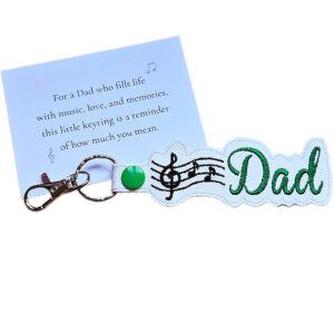 Embroidered Dad Music Note keyring in white faux leather with green Dad lettering, musical note design and keepsake card for a music loving dad.