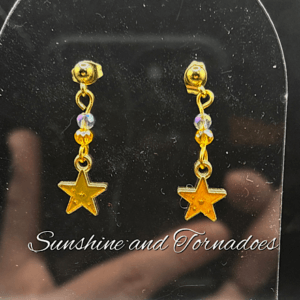 Dainty gold star earrings with tiny crystals for sparkle