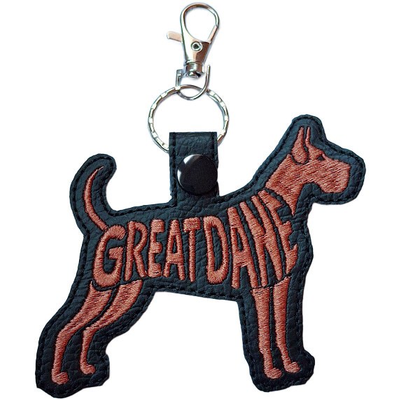 Black embroidered Great Dane word art keyring made from faux leather, with stitched breed lettering and silver metal hardware.