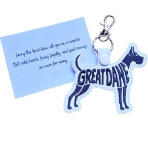 White embroidered Great Dane word art keyring shown beside its keepsake card with a sentimental dog lover message.