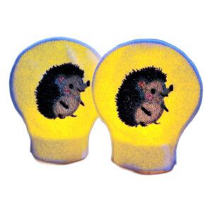 Lit embroidered hedgehog tealight covers glowing warmly over LED tealights, showing cute stitched hedgehogs on soft felt for a cosy woodland display.