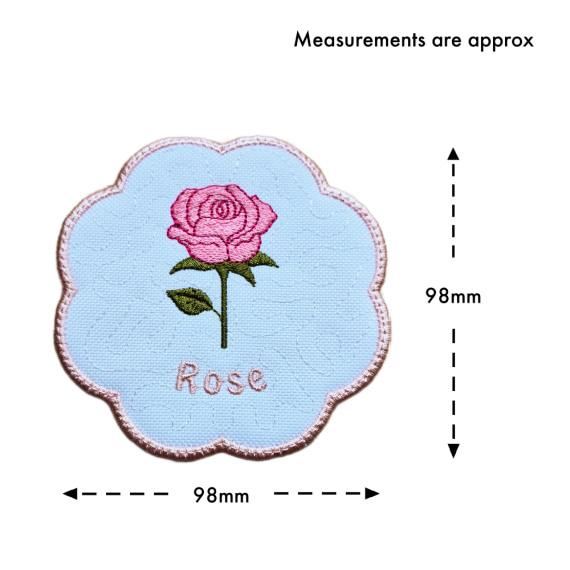 June birth flower candle coaster size guide showing the embroidered rose design with stitched text and scalloped border, measuring approximately 98mm x 98mm.