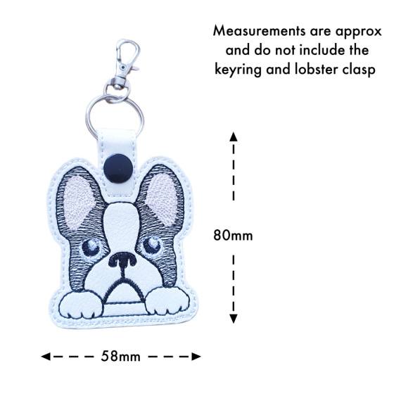Kawaii French Bulldog keyring with size guide showing the embroidered dog design measures approximately 80mm x 58mm, excluding the keyring and lobster clasp.