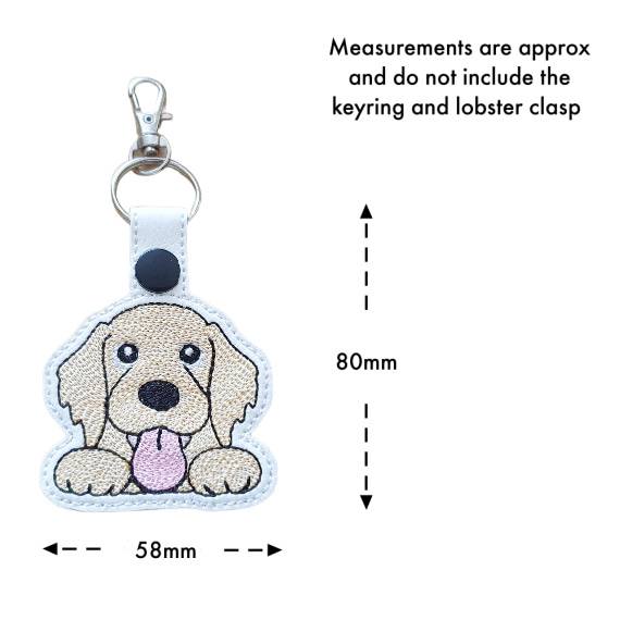 Kawaii Golden Retriever keyring with size guide showing the embroidered dog design measures approximately 80mm x 58mm, excluding the keyring and lobster clasp.