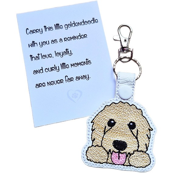 Kawaii Goldendoodle keyring shown beside a keepsake card with a sentimental dog lover message.
