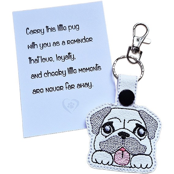 Kawaii Pug keyring shown beside a keepsake card with a sentimental dog lover message.