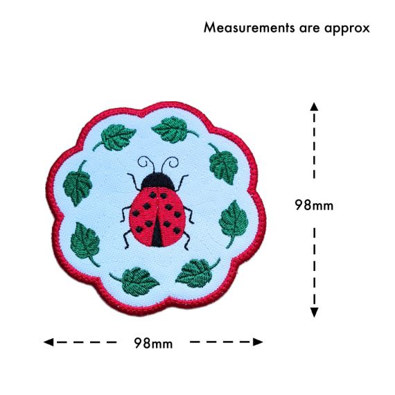 Ladybird candle coaster size guide showing the embroidered scalloped coaster measuring approximately 98mm x 98mm.