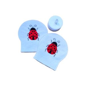 Set of two embroidered ladybird tealight covers made from soft felt, shown with an LED tealight for a cheerful garden inspired display.