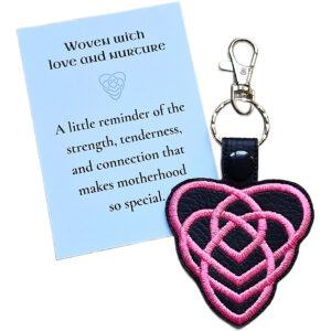 Black Motherhood Celtic Knot keyring with pink embroidered heart knot design, shown with a matching keepsake card about love, nurture and motherhood.