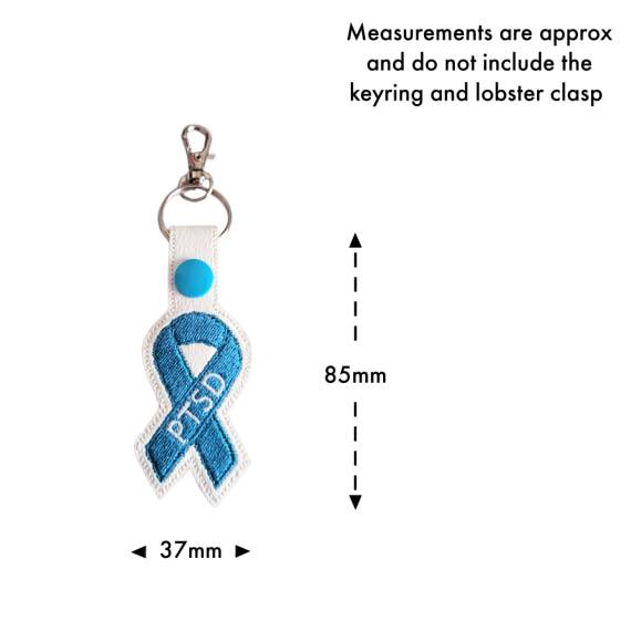 Size guide for embroidered PTSD awareness ribbon keyring, showing approximate measurements of 85mm high by 37mm wide, not including the keyring or lobster clasp.