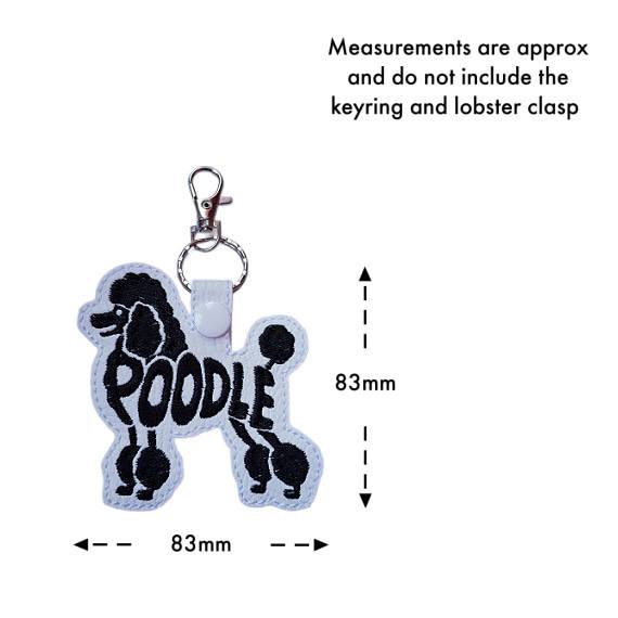 White Poodle word art keyring with size guide showing the embroidered dog design measures approximately 83mm x 83mm, excluding the keyring and lobster clasp.