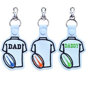 Rugby Dad or Daddy keyrings made from faux leather with embroidered rugby shirt designs in blank, Dad and Daddy options