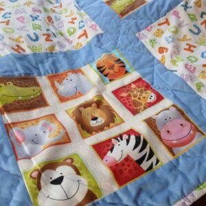 Children’s patchwork quilt. Approx 41 inches square. All proceeds to The Stroke Association