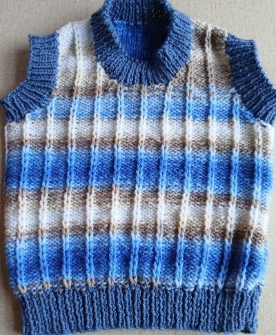Hand knitted baby pullover. Approx 3 to 9 mths. Proceeds to The Stroke Association