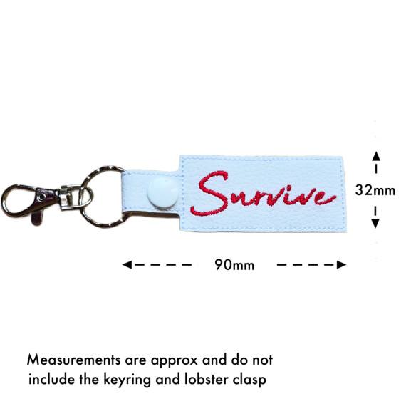 Embroidered Survive keyring with size guide showing approximate measurements of 90mm by 32mm excluding the keyring and lobster clasp.
