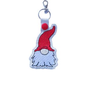 Embroidered woodland gnome keyring in faux leather, with a green hat, white beard and sturdy metal keyring hardware.